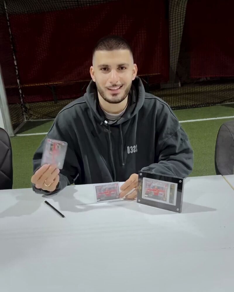 Bundesliga professional Deniz Undav (VfB Stuttgart) with his trading card graded by AP Grading in an AP slab