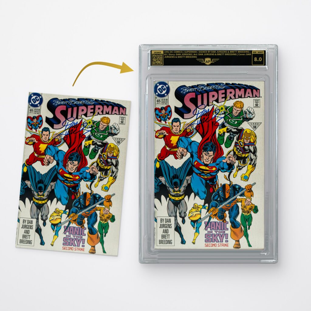 Comic & box topper grading: comic before grading and in the AP comic slab with label and grade